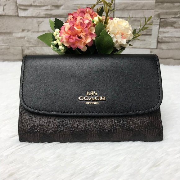 Coach Handbags - 👜‼️SALE‼️🌺MEDIUM ENVELOPE WALLET 6"